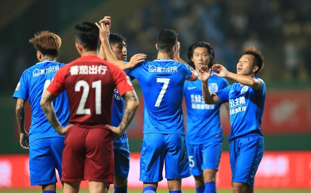 关于上港夺得三分，坚守积分榜领先地位的信息